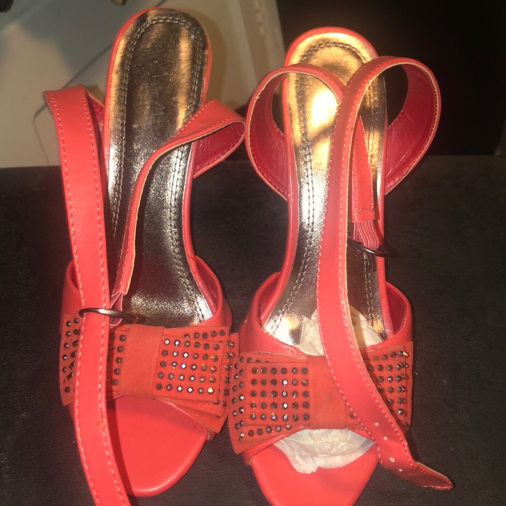 Never worn heels coral color in size 7.5